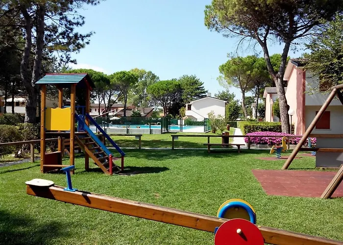 Апартаменты Bright Flat With Garden And Pool Бибионе